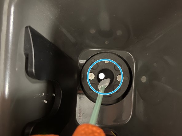 Pulling on the IR sensor, remove it from its mount and unplug the yellow ethernet cable.