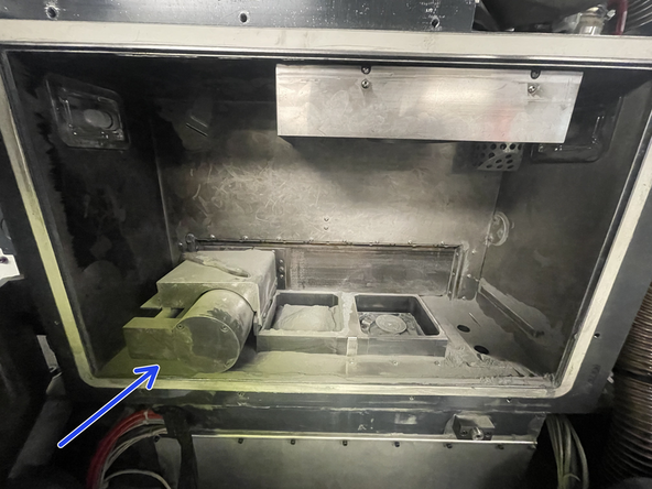 Pay special attention to fully reach under the airlock door. Closing the door will make this easier.