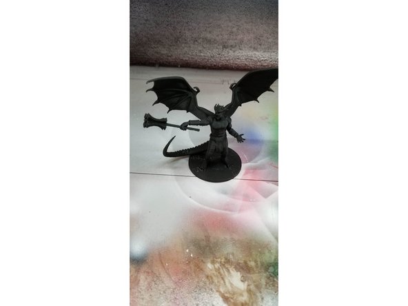 Place your models in the filter box near the back filter material. Turn the filter on and give it a second for the fans to get to full speed. Put your paint into the brush, don't fill the entire paint hopper, you usually need much less than you think. For printed objects, you will want to apply a coat of primer before adding colored paints.