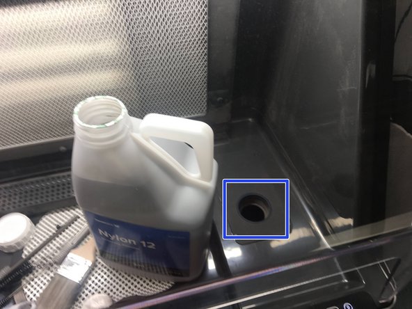 To open the bottle, twist off the cap, and flip it over, using the sharp point to cut off the seal