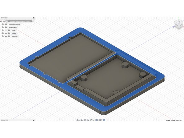 Began by selecting the middle surface again. Create a sketch off here.