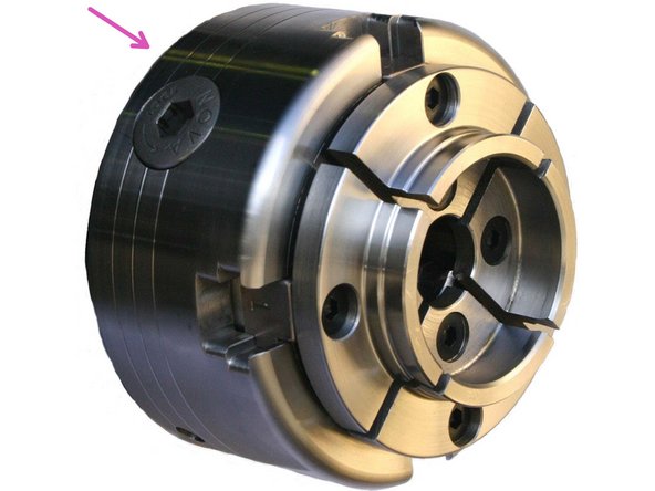 A faceplate is one of the most secure methods to secure piece. Screw the faceplate onto a workpiece about it's desired axis of rotation