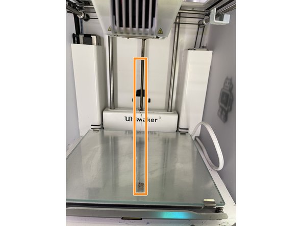 After the material has been forwarded, wait until it extrudes from the print head, and then push the button