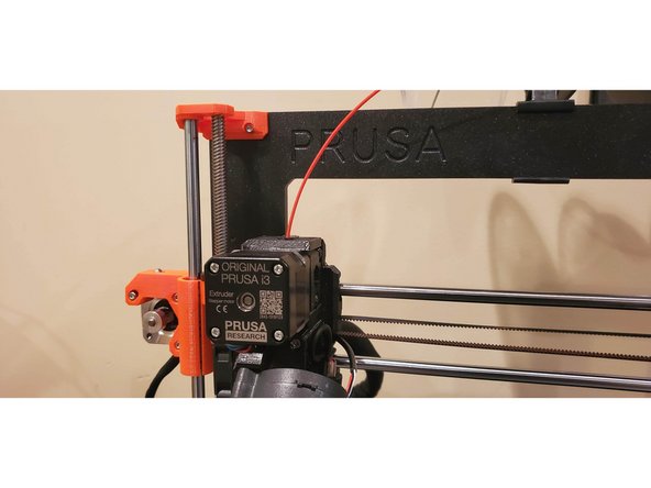 Rotate the dial until the extruder assembly is a good distance from the build plate