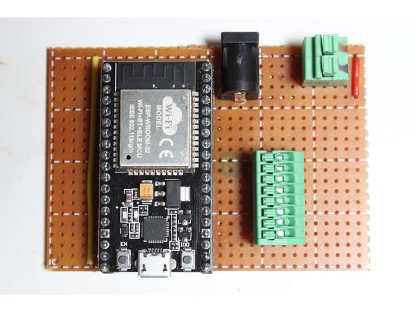Solder in two wire jumpers, a 2.1mm jack, two female 19-position headers, a 5mm 2-position terminal, and a 2.54mm 8-position terminal as shown.