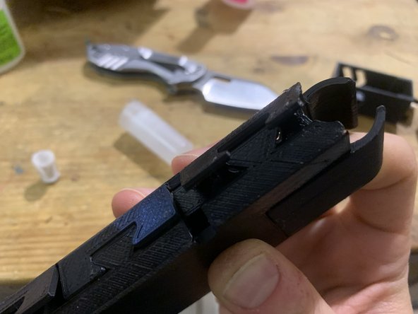 Gently fold each locking tab almost into position.