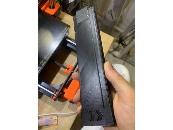 Add the endcap. Don't glue it! If it's loose, use two surplus Nerf blaster screws to screw it into place.