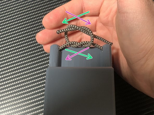 Tie a single overhand knot.