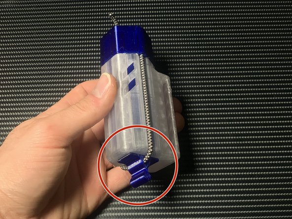 Insert the ramrod into the case and put the toggle flat against the bottom.