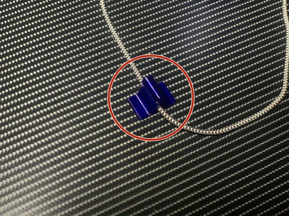 Thread the toggle onto the 12&quot; shock cord.