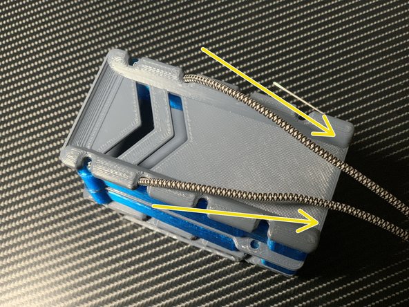 Pull the cord to bring the pieces together. They should be snug but not tight.