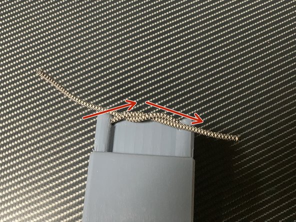 Time to finish the job. The Warp Saya is held together by a square knot.