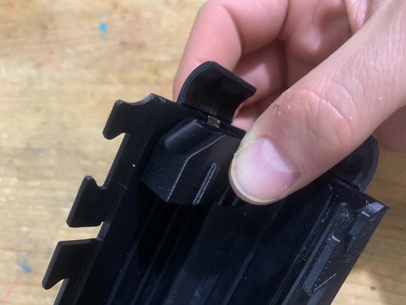 Add the follower and push it down onto the rails.