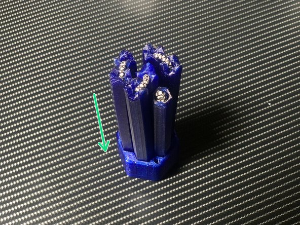 Fold the Scramrod up and nest the segments into the handle.