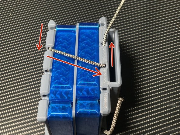 Now we'll thread the rest of the loops. You may need to use the pin to pull the cord around corners.