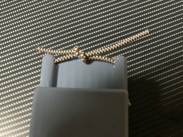 Tie a second overhand knot.