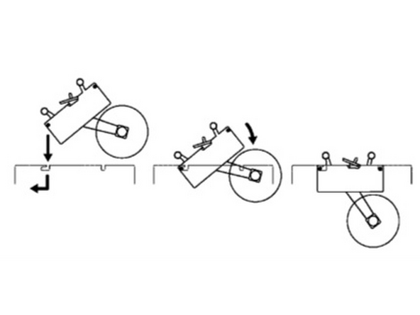 Machines are shipped with the tape heads secured in their brackets. To reinstall the tape heads, lower them into the brackets to align the pins on their sides with the slots in the brackets. Follow these steps: