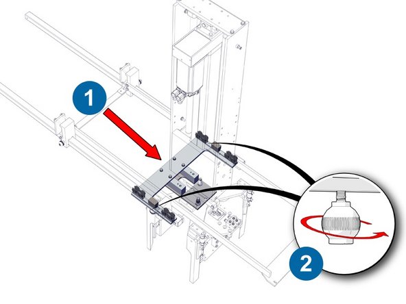 Push the mandrel trolley back against the ram mounting plate.