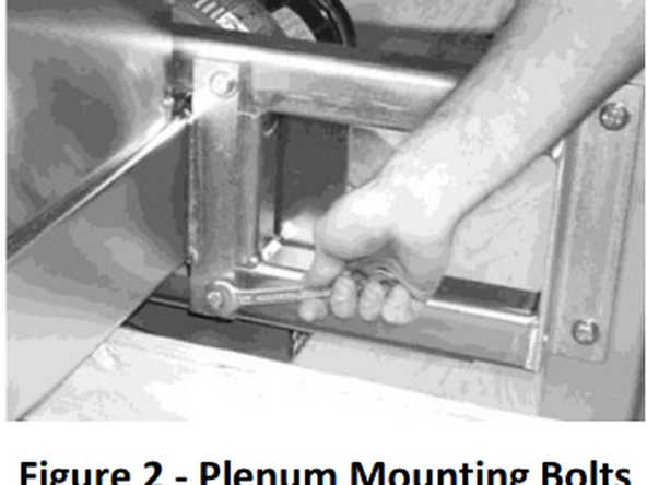 The vacuum plenum assembly is removed for shipping. Re-install it on the front of the machine as shown in  Figure 1 to Figure 3 below.