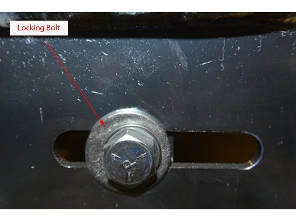 On the adjusting screws, re-tighten the outer nuts.
