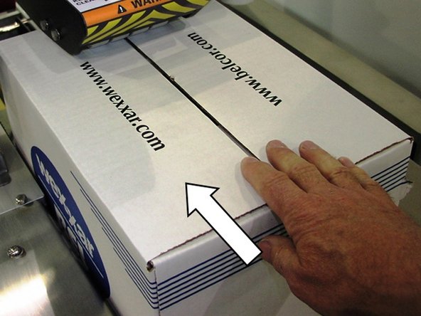 Fold down the top flaps by hand.