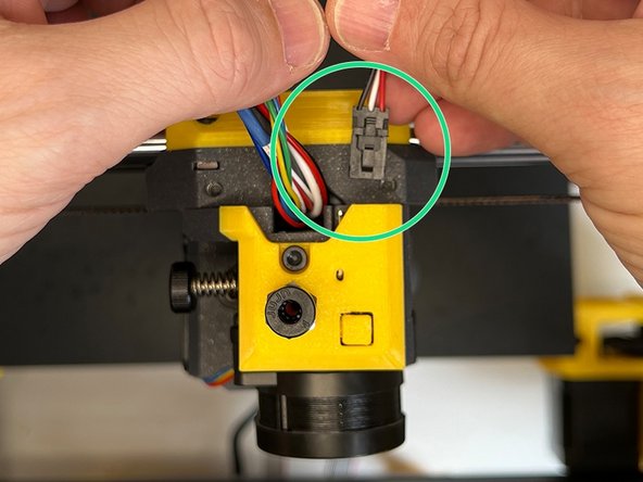 Insert the Zaribo Filament Sensor connector and add its cable to the harness. If there is a rib behind the connector, feel free to trim it with a cutter. Some connectors might have a small rib at the back.
