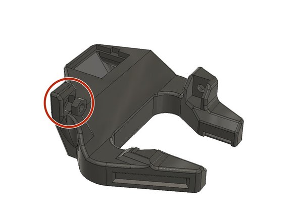 Insert an M3 Hex Nut into the slot on the fan shroud.