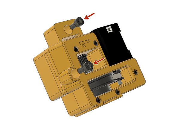 Insert M6 x 12 mm screws in the holes seen in the picture.