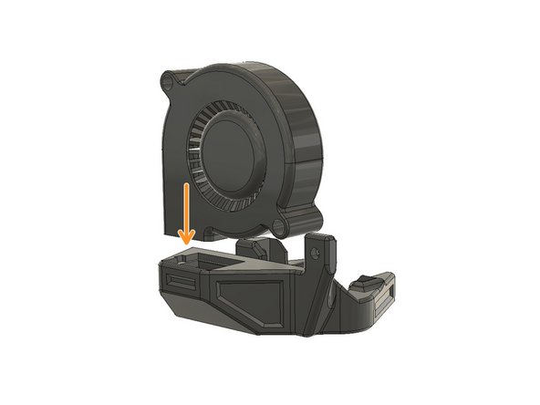 Insert the 5015 Blower Fan into the slot on the fan shroud.