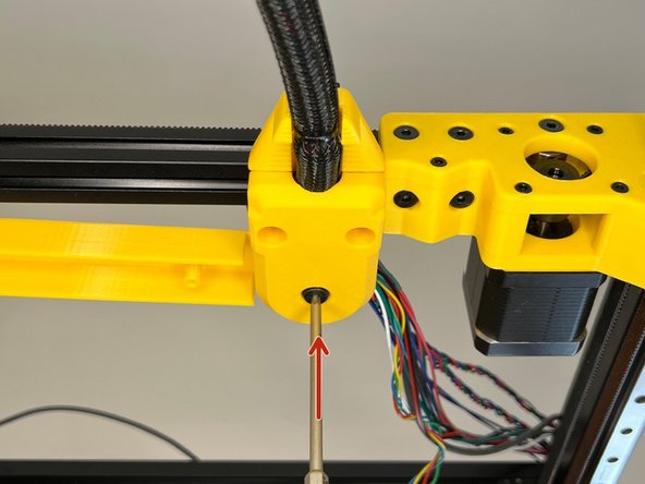 Use a zip tie and tuck in the cable harness by dividing it into two equal portions after the zip tie.