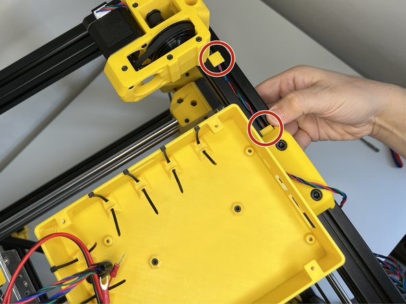 Tuck in the Z Motor 4 cable and use the 3030 cable clips to keep them in place. Push the cable and the clip under the DIN Rail holder slot.