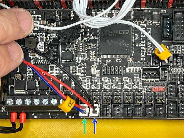 Connect the hotend thermistor cable connector to the slot on the picture. The slot on the left is for the heated bed thermistor.