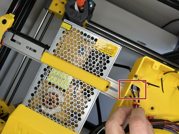 Pass the cables through the hole under the mainboard housing.