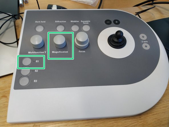 Drop the FluCam screen by pressing 'R1' button on the handpanel and change the magnification to 120k by turning the 'Magnification' knob anticlockwise.