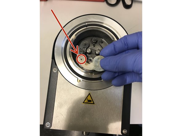 Place the shutter back on the intended triangular metal mold. The shutter holds by magnetism.