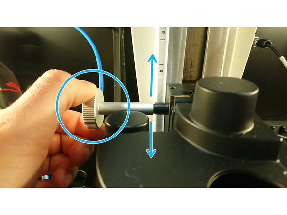 Go to live view with a low magnification objective and focus your sample.