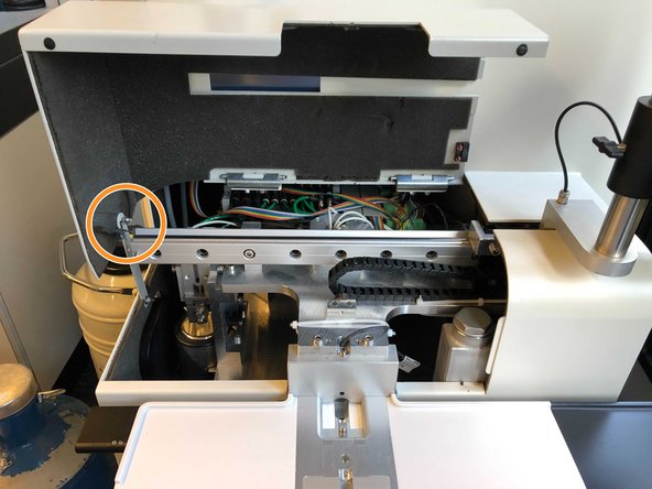 Open the front safety cover and prop it using the cover support lock.