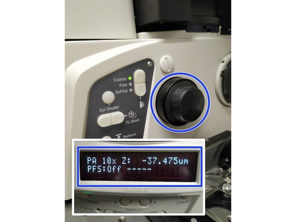 Lower the objectives by using the &quot;Focus wheel&quot; (check on the front panel if the &quot;Z&quot;-value decreases)