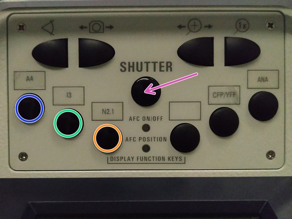 On the front panel of the microscope select an appropriate fluorescence filter: