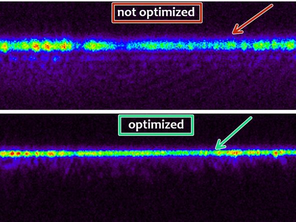 Adjust the correction ring to minimize reflection signal width corresponding to maximum intensity.
