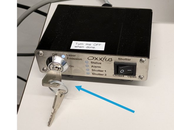 Turn the laser key to "ON" position