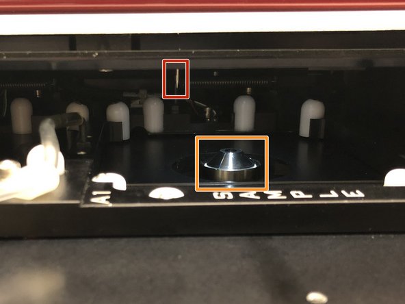When cleaning the objective be careful not to touch the needle of the fluidics handling system.