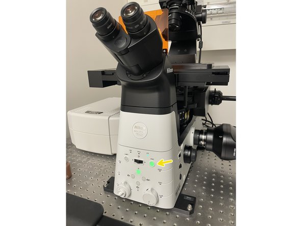 With this you will lower the objective to the lowest position.