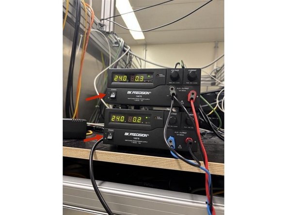 Turn on the 2 power supplies (top left of the microscope).