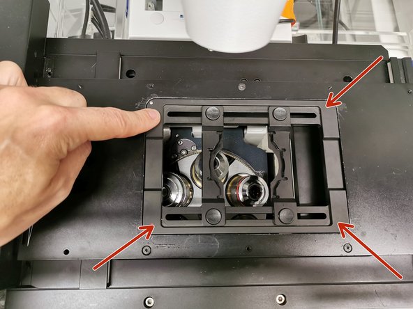 To load a new insert you should place the insert in the top left corner and apply slight pressure against the clamps while sliding in the complete insert.