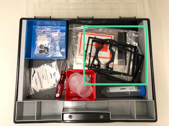 Other holders (eg. 96 well plates) are stored in a box on a shelve behind the microscope.