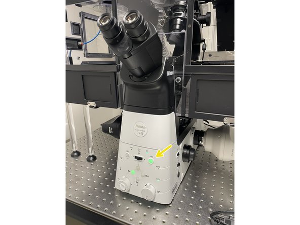 With this you will lower the objective to the lowest position.