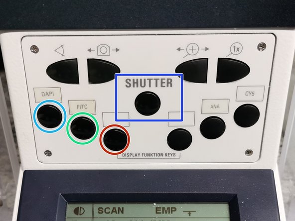 On the front panel of the microscope select an appropriate fluorescence filter: