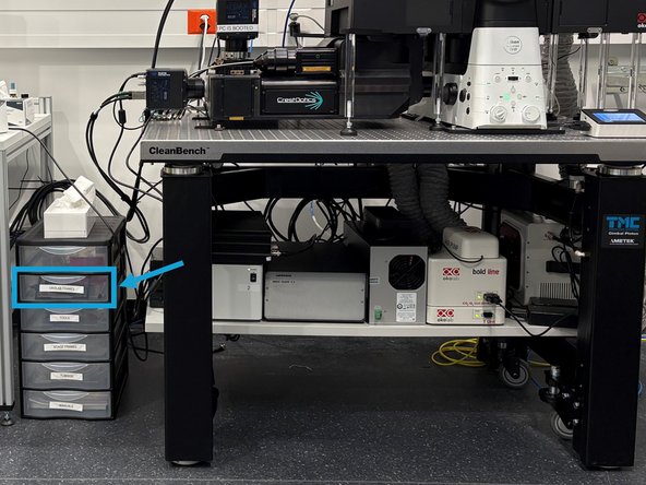 Turn on the light in the box, if needed.