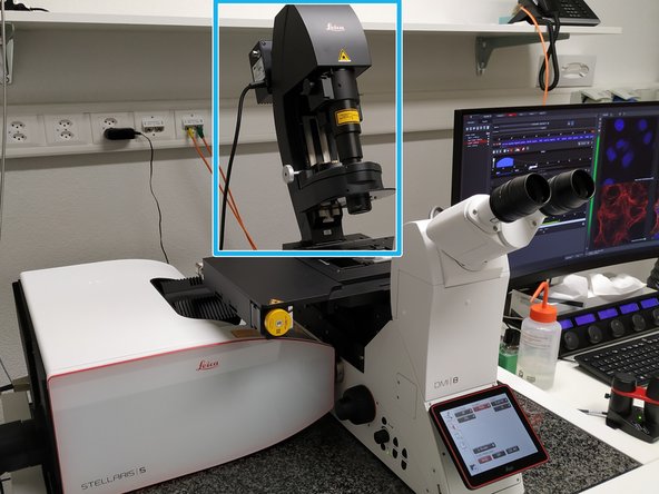 Push the condenser arm of the microscope back.